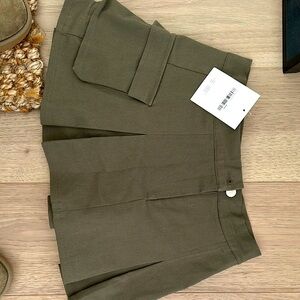 Olive Green pleated short skirt from oak and fort - the coolest colour!